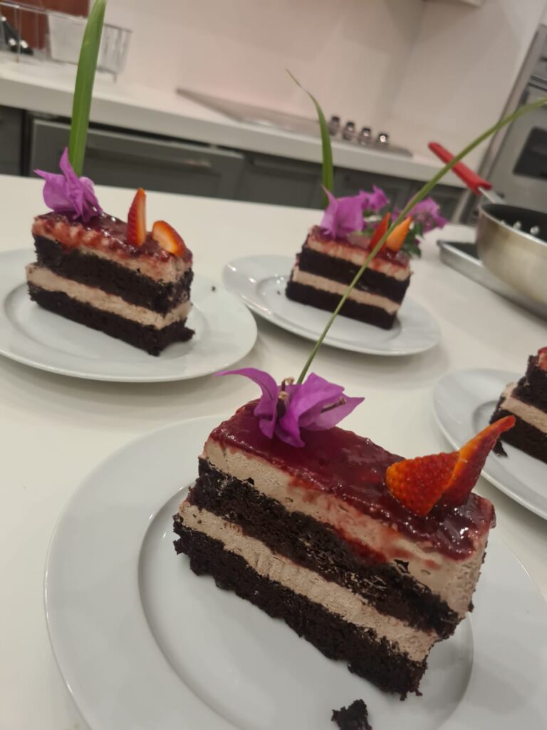 Chocolate and cream cake with strawberry top